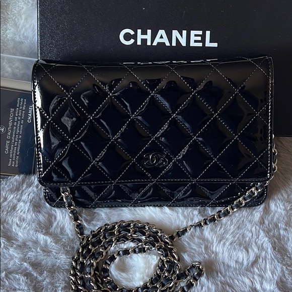 silver chanel wallet on a chain